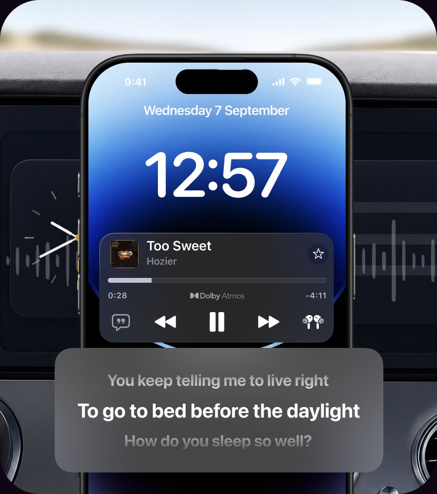 Lyricast showing synced lyrics on iPhone Lock Screen, mounted in a car dashboard